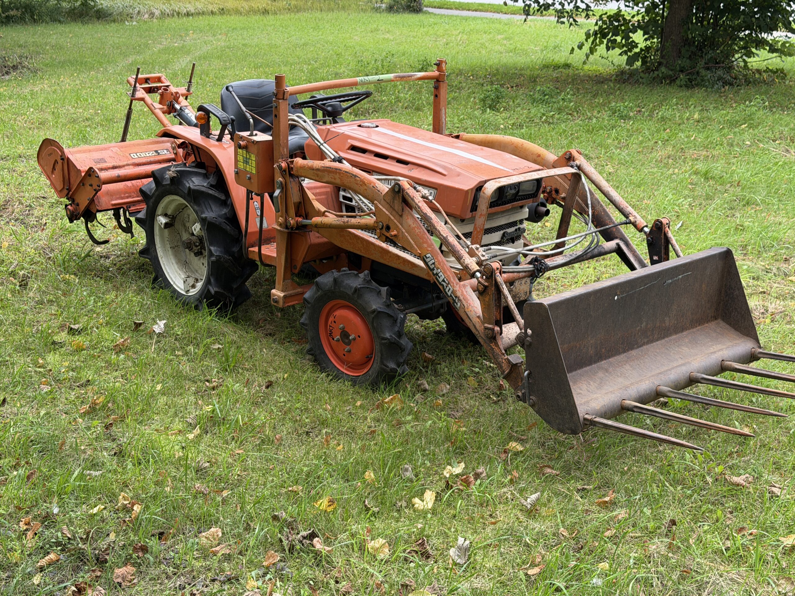 Naudotas traktorius KUBOTA B1500 (14 kW, su frontaliniu krautuvu) 13 Naudotas traktorius KUBOTA B1500 (14 kW, su frontaliniu krautuvu)